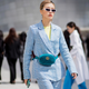 SEOUL, SOUTH KOREA - MARCH 20: A guest wearing velvet Gucci funny bag, blue suit is seen at the Hera Seoul Fashion Week 2018 F/W at Dongdaemun Design Plaza on March 20, 2018 in Seoul, South Korea. (Photo by Christian Vierig/Getty Images)